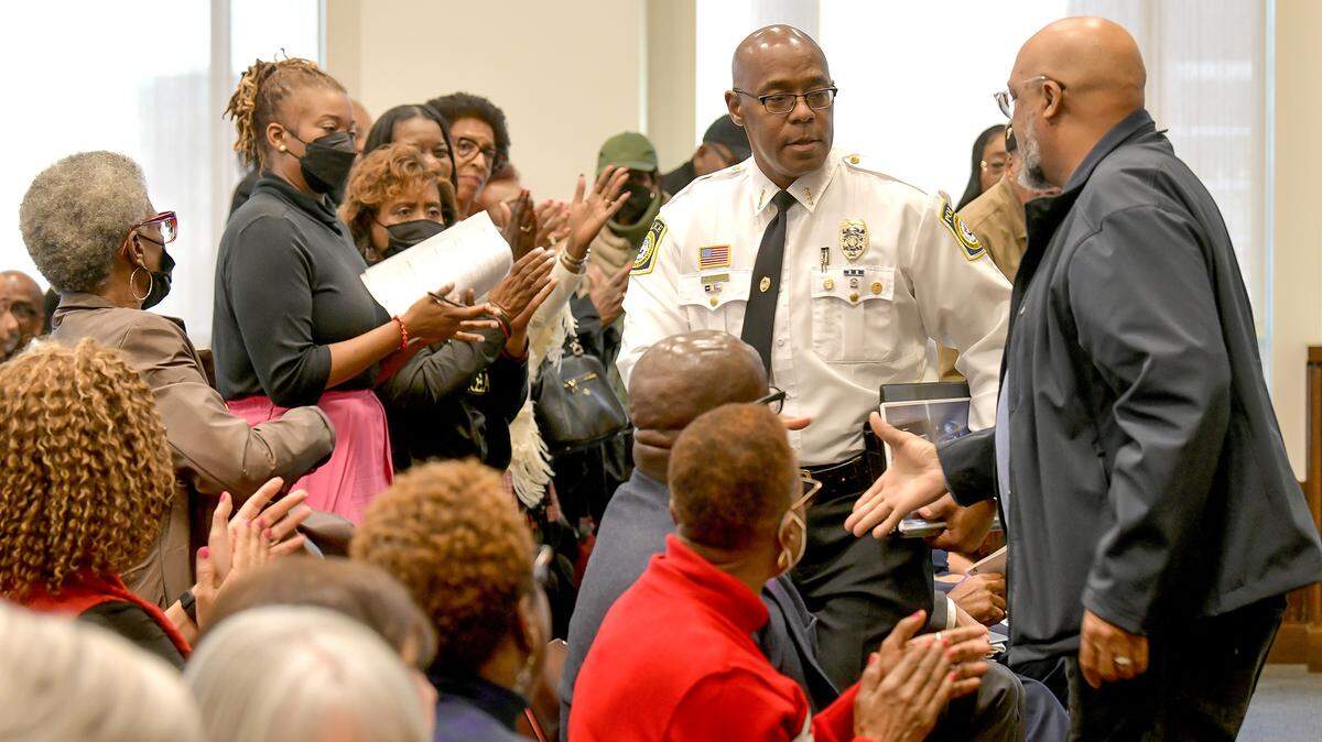 Columbus Police Chief Freddie Blackmon is greeted by supporters after presenting his strategic plan to council last month. Blackmon has been offered a severance package by city leaders.