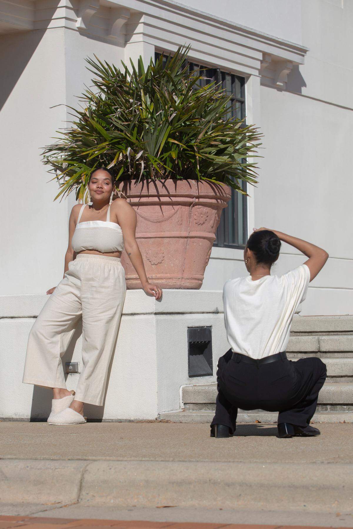 Content creators Sydnie Haag and Mailee Barkdull collaborate on a brand shoot at the Columbus Museum on Nov. 1, 2021.