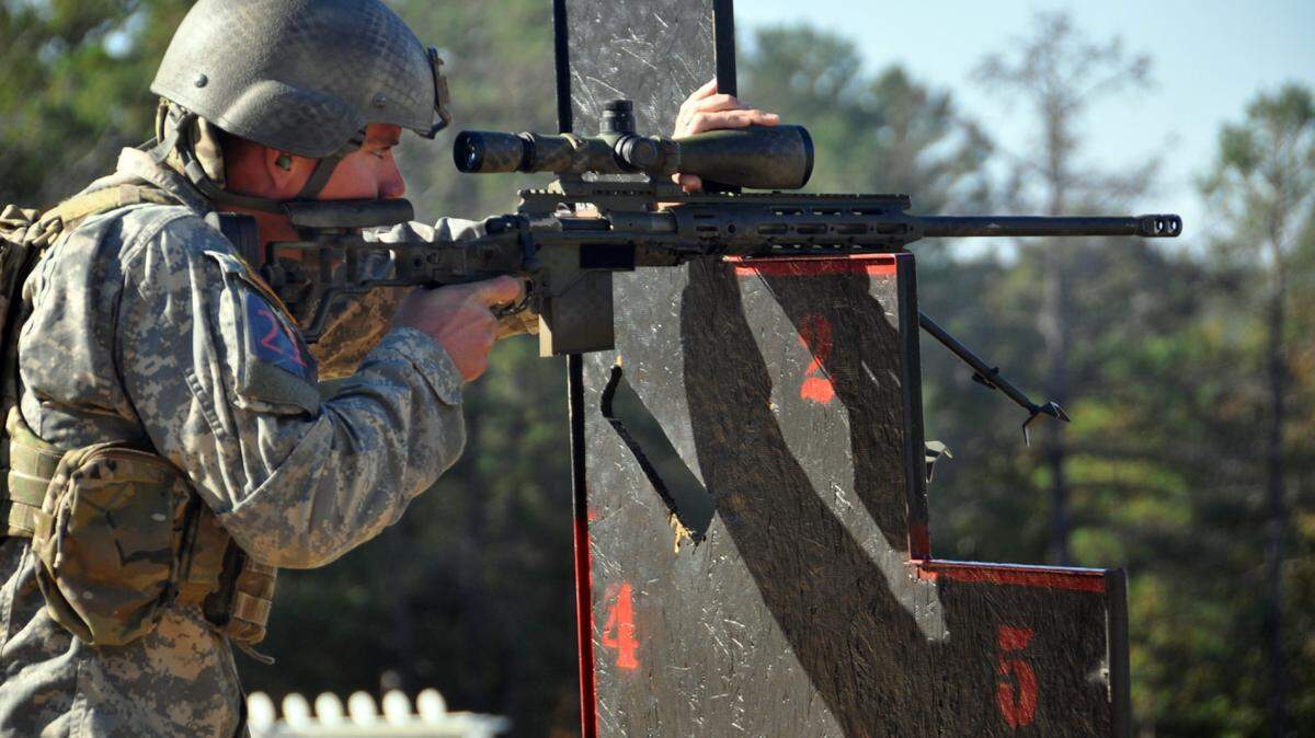 FORT BENNING, Ga. -- Spc. Tyler Payne, U.S. Army Marksmanship Unit, fires on a target during the 2012 International Sniper Competition Nov. 5 at Burroughs Range. Payne and his USAMU teammate Staff Sgt. Daniel Horner won the competition in their first attempt. Both Soldiers are members of the USMAU's Action Shooting team. 
 (Photo by Michael Molinaro, USAMU)