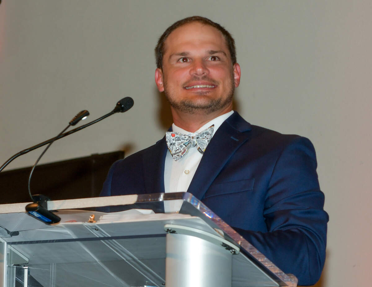 Clubview Elementary School physical education teacher Chris Grier delivers his acceptance speech after the Muscogee Educational Excellence Foundation announced him as the Muscogee County School District 2026 Teacher of the Year during MEEF’s gala May 7 at the Columbus Convention & Trade Center.