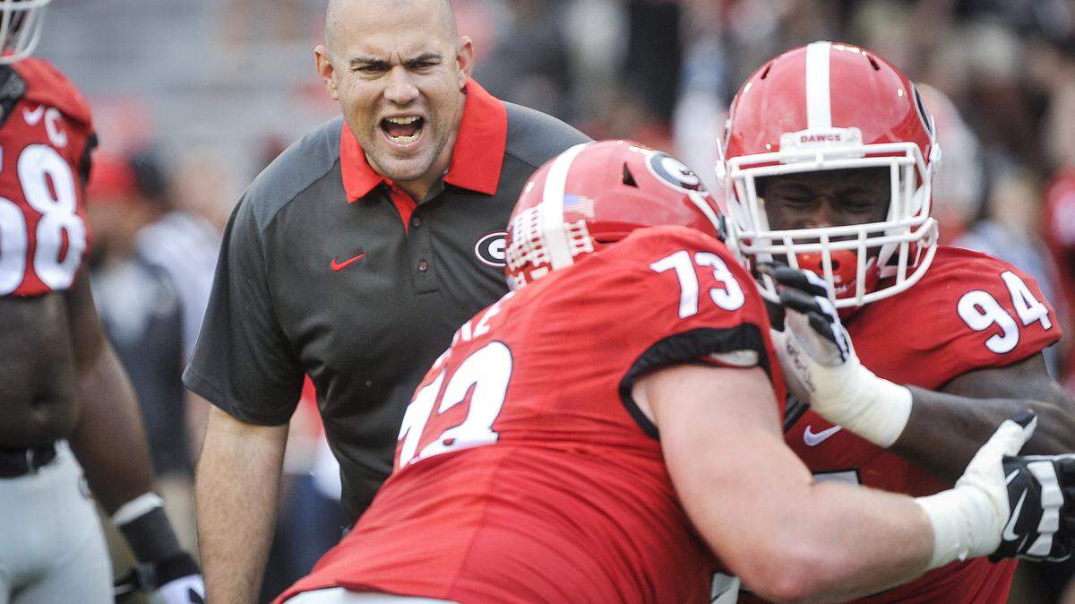 JOHN AMIS/Associated PressGeorgia offensive line coach Rob Sale yells to players as he watches warm ups Saturday before the game against Kentucky in Athens, Ga. Georgia won 27-3.