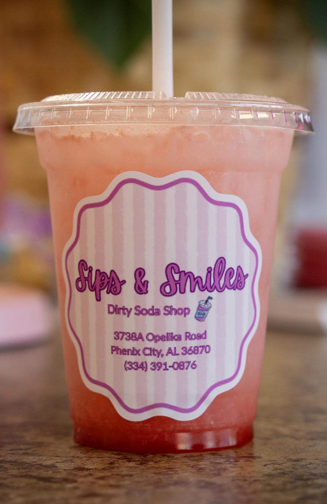 Sips & Smiles, a “dirty soda” shop, has opened at 3738 Opelika Road in Phenix City Customers have a variety of options to customize their drinks, such as the Pink Cloud, pictured April 13, 2026.