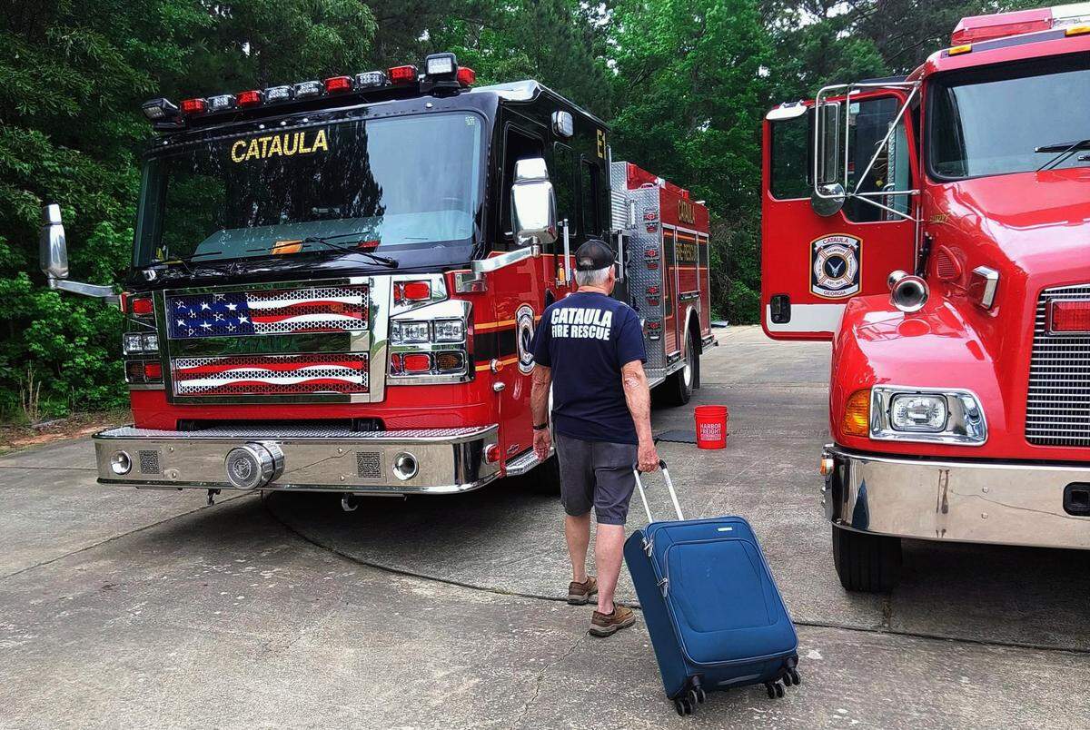 Tim Ryan, a firefighter with Cataula Fire-Rescue in Harris County, deployed to assist with the wildfire in Brantley County, Georgia.