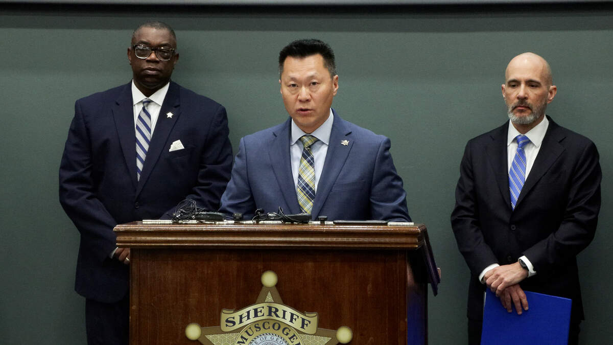 Jae W. Chung, special agent in charge with the Drug Enforcement Administration in Atlanta, center, speaks during an April 20, 2026, news conference at the Muscogee County Sheriff’s Office in Columbus about the results of Operation Sweet Silence.