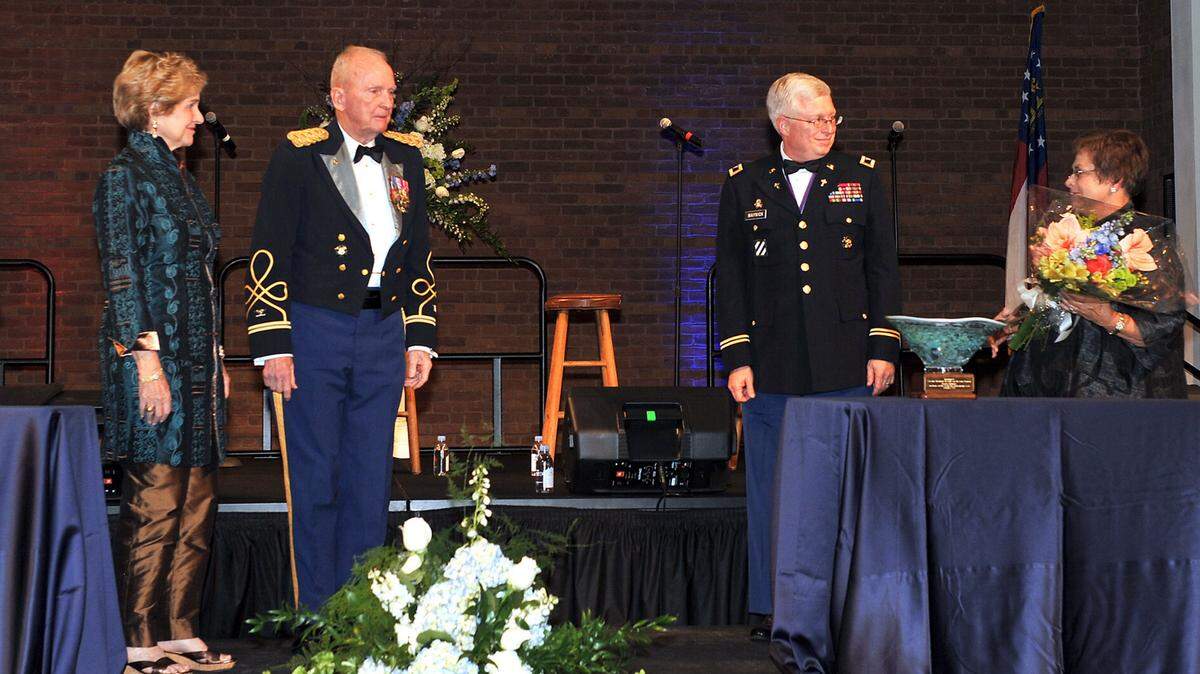 Darrell Roaden/Special to the Ledger-EnquirerRetired Col. Ralph and Jeannie Puckett receive the Sue Marie and Bill Turner Servant Leadership Award during a gala Thursday at the Columbus Convention & Trade Center.