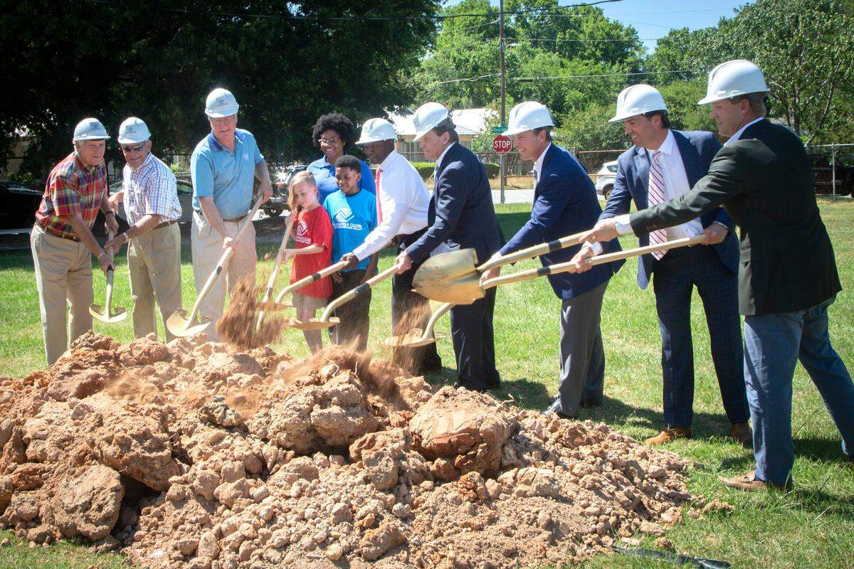 Leadership and students at the North Columbus Boys & Girls Club break ground on a new teen center, the John F. Flournoy Sr. College and Career Center, at the club on May 17, 2022, in Columbus, Ga.