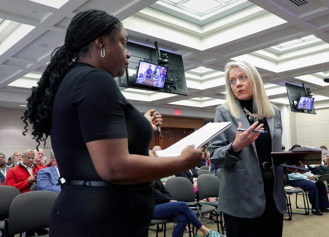 During the March 4, 2026, Columbus Planning Advisory Commission meeting, Choose Columbus president and CEO Missy Kendrick, right, answers a question posed by someone who voiced concerns about a proposed data center project in Columbus.