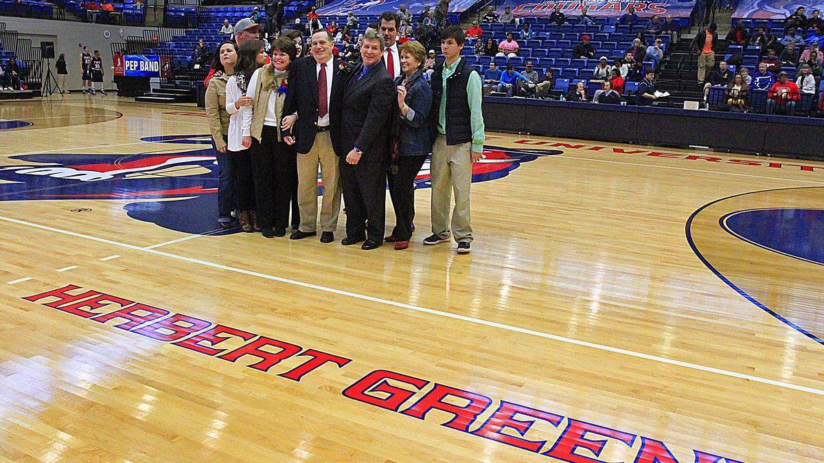 Mike Haskey mhaskey@ledger-enquirer.com 
 Herbert Greene, his family and CSU officials gather for a group photo Saturday afternoon after the court at the Lumpkin Center was named in Greene’s honor. 01/03/15