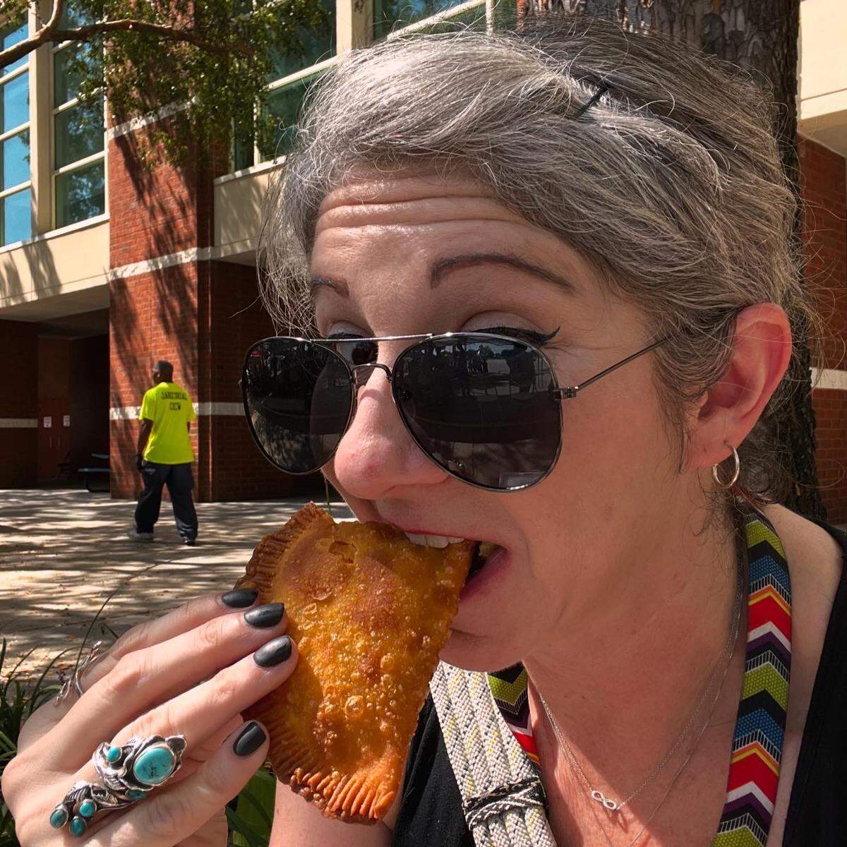 This reporter enjoys an empanada during the Tri-City Latino Fest in Columbus, Ga.