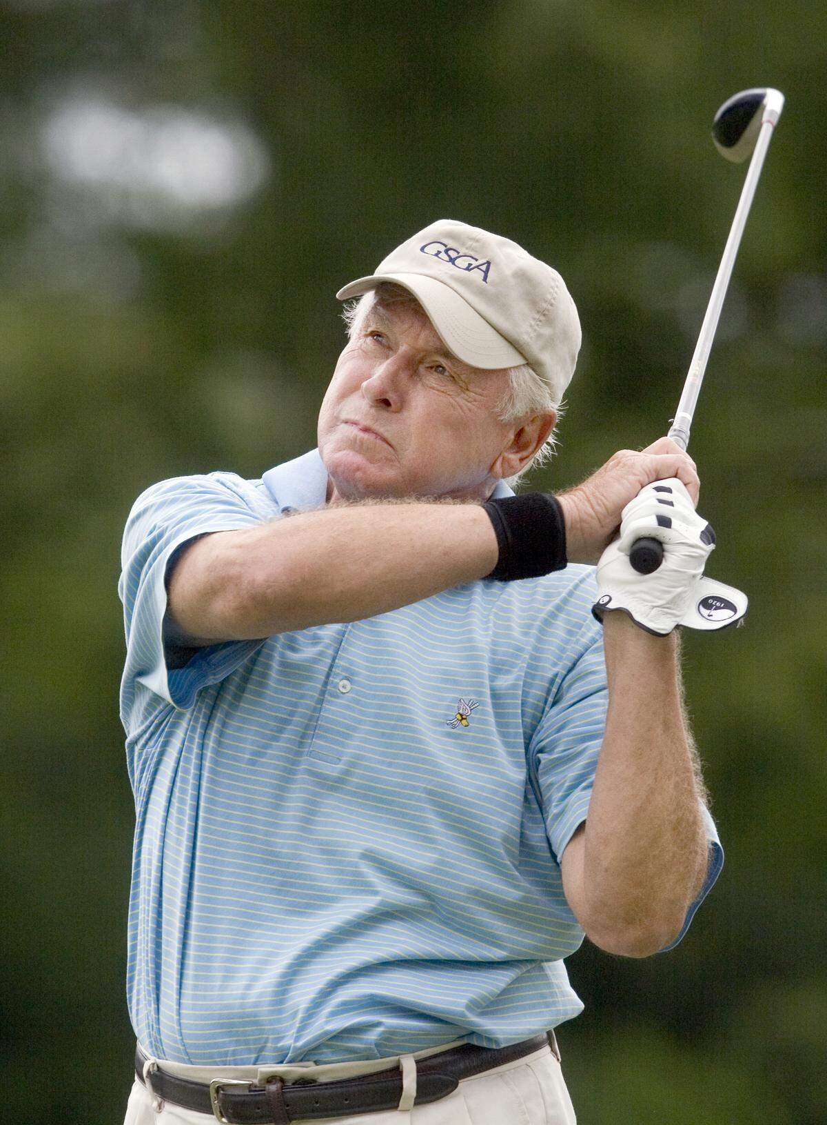Bill Ploeger of Columbus watches his drive during the second round of the 2009 Georgia Amateur Championship tournament at the Country Club of Columbus.