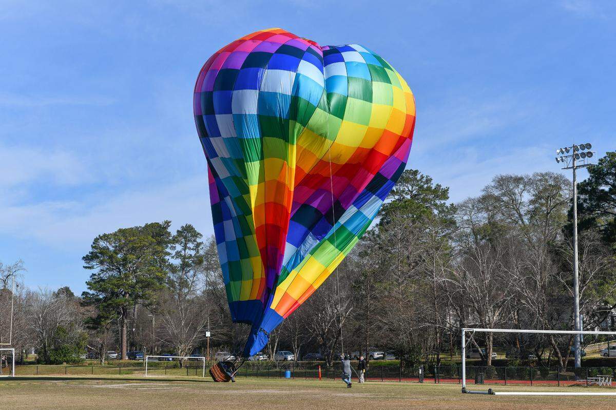 Pilot Gary Brossett and co-pilot Dorinda Morpeth made an unscheduled landing in Columbus’ Lakebottom park with Brossett’s hot air balloon named “Kalos” Thursday. After taking off from Crawford, Alabama, with the intention of landing near Ladonia, Alabama, Brossett said winds forced them to come up with an alternate landing site. 01/13/2022