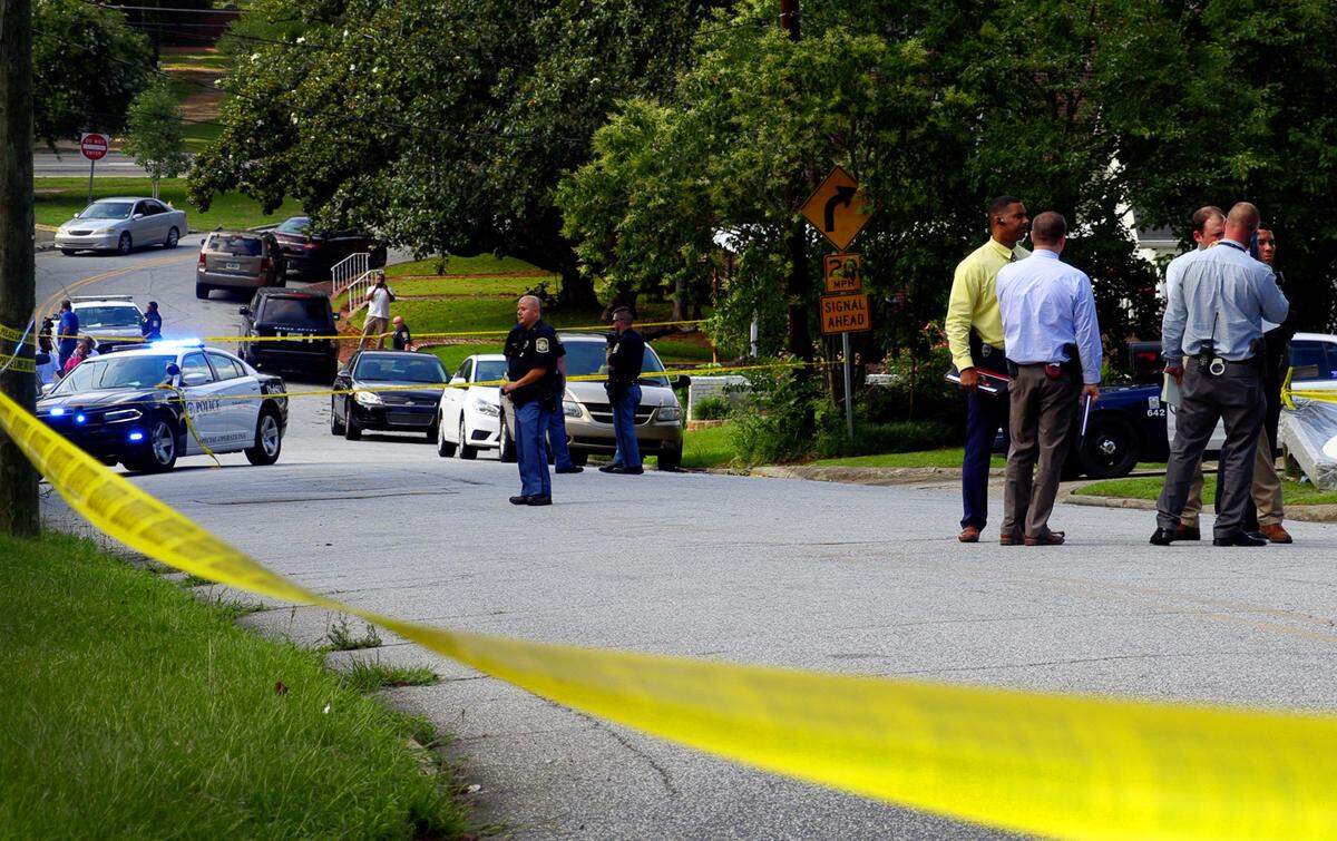 Police investigate the scene of a shooting on June 11, 2019 on 18th Avenue in Columbus, Georgia. Courvoisia Brenica Wilson appeared in Columbus Recorder’s Court Tuesday, July 15, 2019 for a preliminary hearing related to the incident. She faces charges of aggravated assault and possession of a firearm or knife during the commission of a crime. Go to www.ledger-enquirer.com for video from the scene.