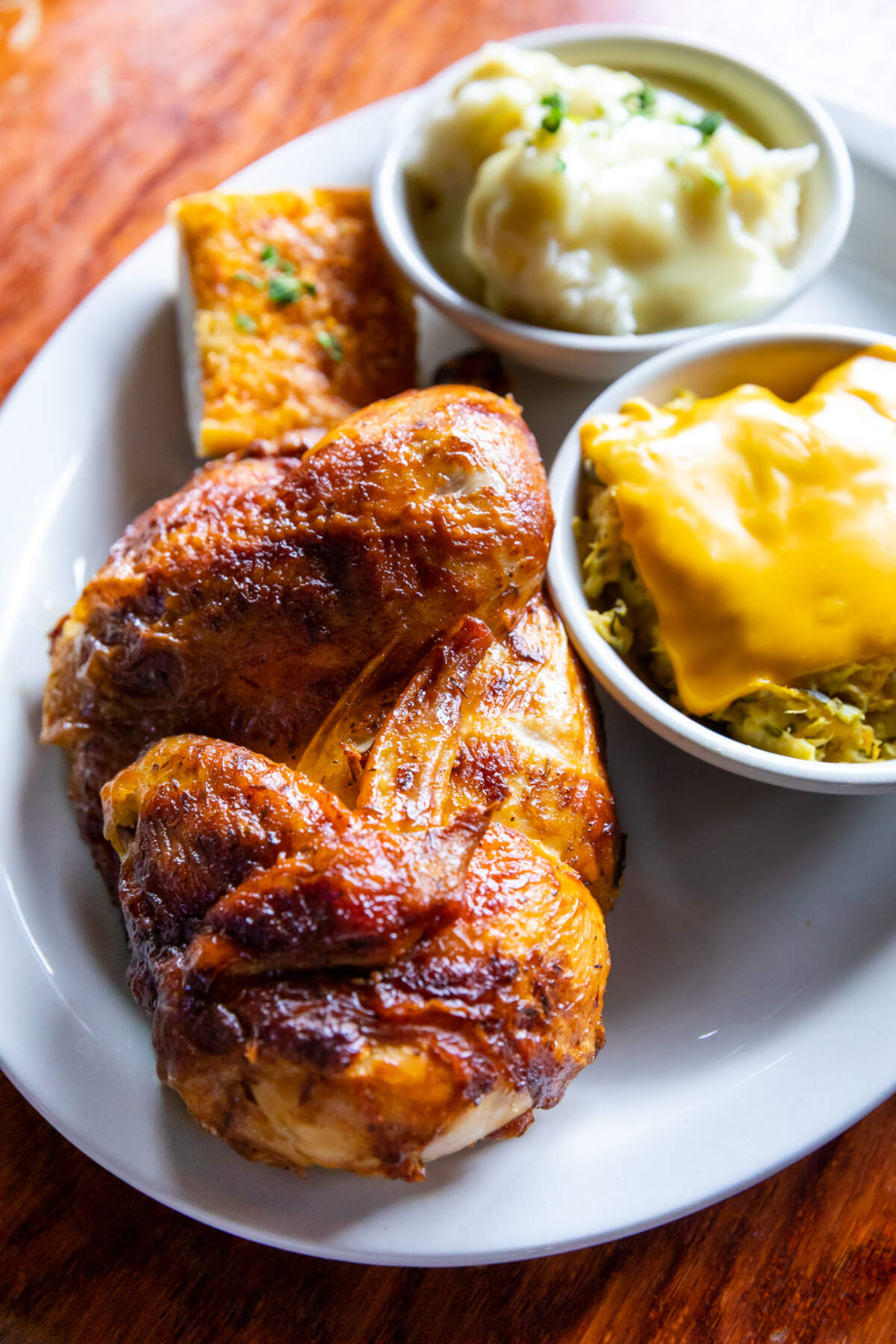 Rotisserie chicken, slow-roasted in homemade marinade blends, is a featured item on B. Merrell’s menu.