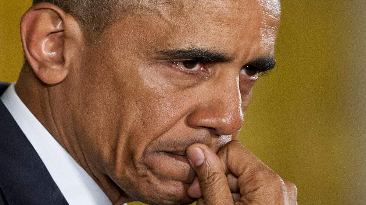 A tear wells up in President Barack Obama's eye as he speaks about the youngest victims of the Sandy Hook shootings Tuesday in the East Room of the White House in Washington. while speaking about steps his administration is taking to reduce gun violence.