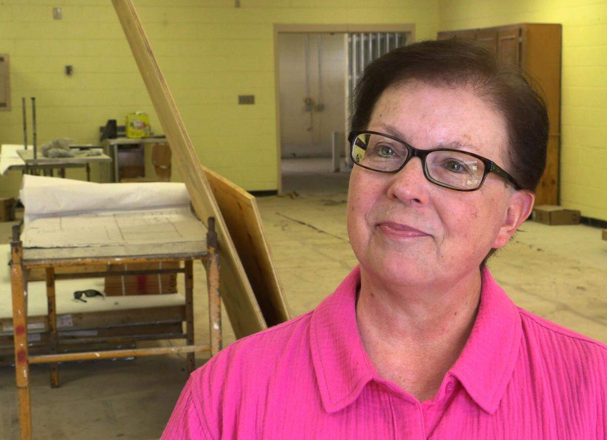 Kim Jenkins, executive director of Open Door Community House, talks about the construction of The Food Mill Shared Kitchen at the Fox Community Center, next to Fox Elementary School, in Columbus, Georgia.