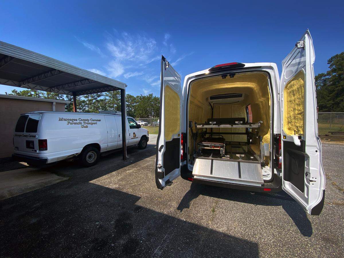 The Muscogee County Coroner’s office officially has a new transport van, right, after mechanical issues with their last van, left, forced them to transport dead bodies using a U-Haul. The new van is an upgrade from the previous van which had over 300,000 miles and was constantly in the shop. 07/28/2023