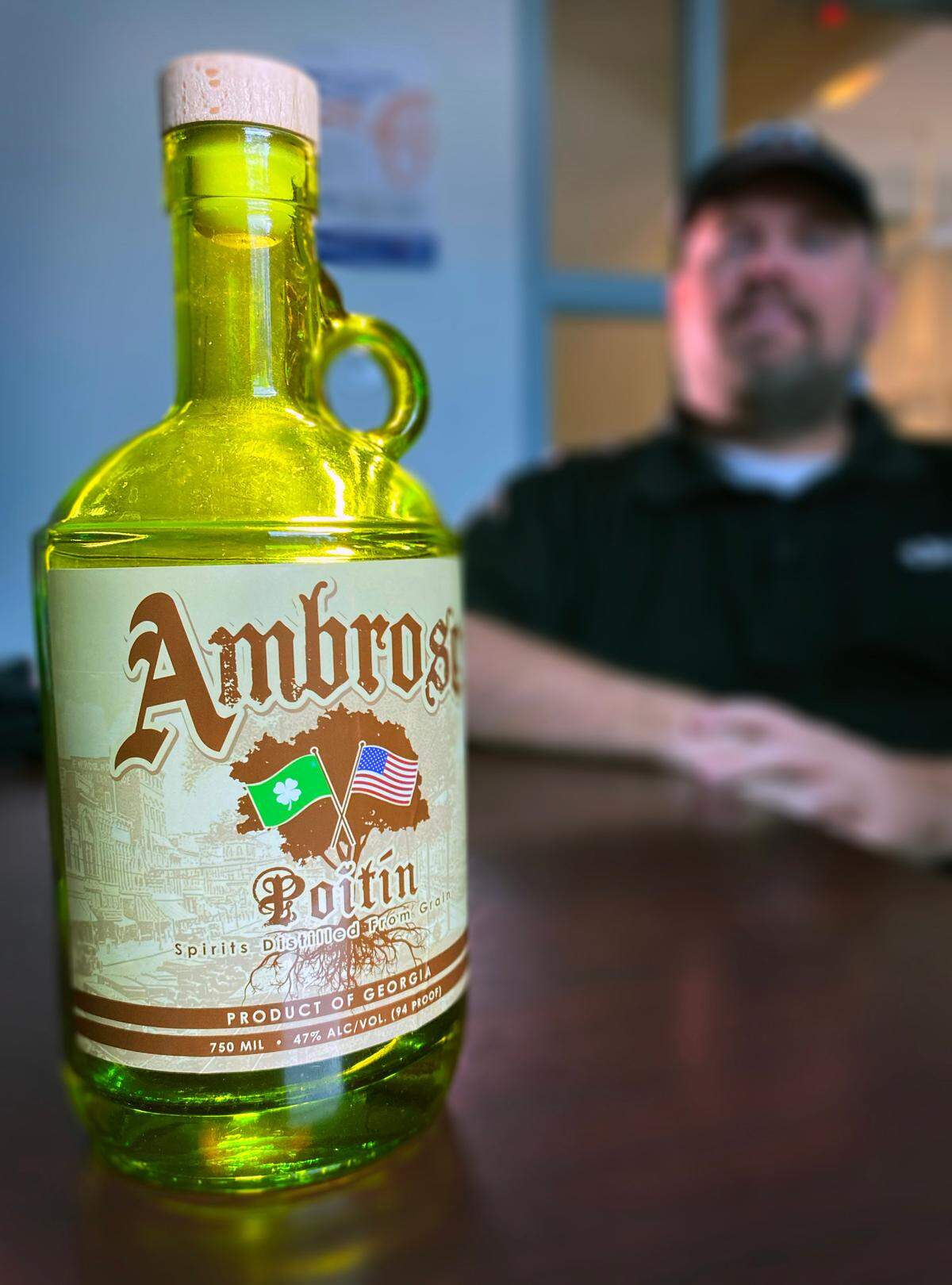 Jon Brannan, the founder and owner of N3 Beverage Company LLC, shows up his signature product, Ambrose Poitín.