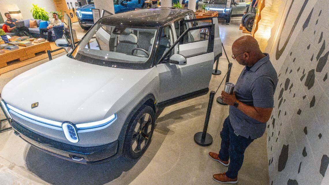 Electric vehicle maker Rivian: ‘We are not abandoning Georgia’ after pause in plant build