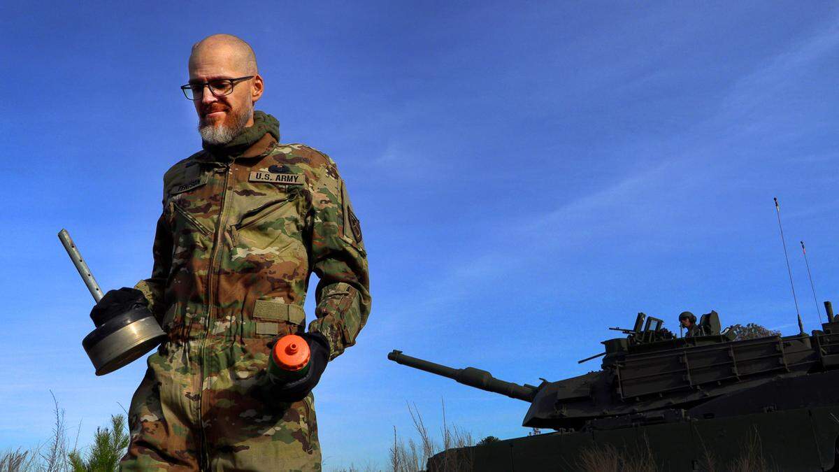 Jay Tenison, a military veteran currently fighting Stage IV stomach cancer, fires a tank Tuesday afternoon at Fort Moore, Georgia. 12/05/2023