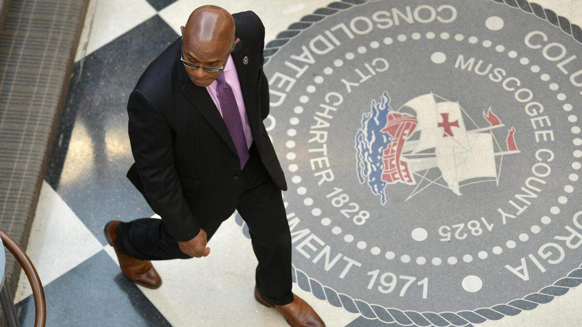 Columbus Police Chief Freddie Blackmon leaves the Columbus Council meeting Thursday after council went into executive session. 04/06/2023