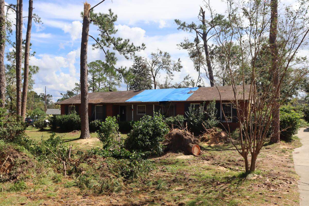 Daniel and Amber Shahan’s home was spared from a tree penetrating their home during Hurricane Helene. A tarp that Shahan put on his roof after Idalia has stayed steady for the entire year, even after Hurricane Helene. Oct. 4, 2024