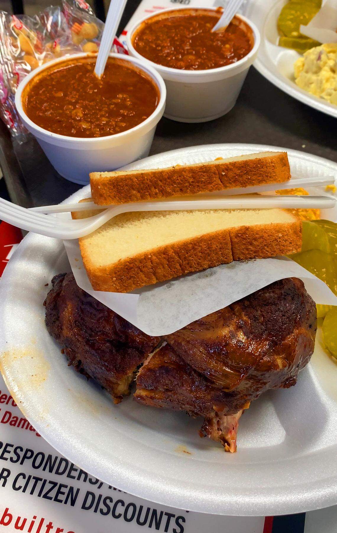 Ledger-Enquirer photographer Mike Haskey got the Thursday special (the half barbecue chicken with two sides) at Mike & Ed’s Bar-B-Que restaurant in Phenix City on March 5, 2026.