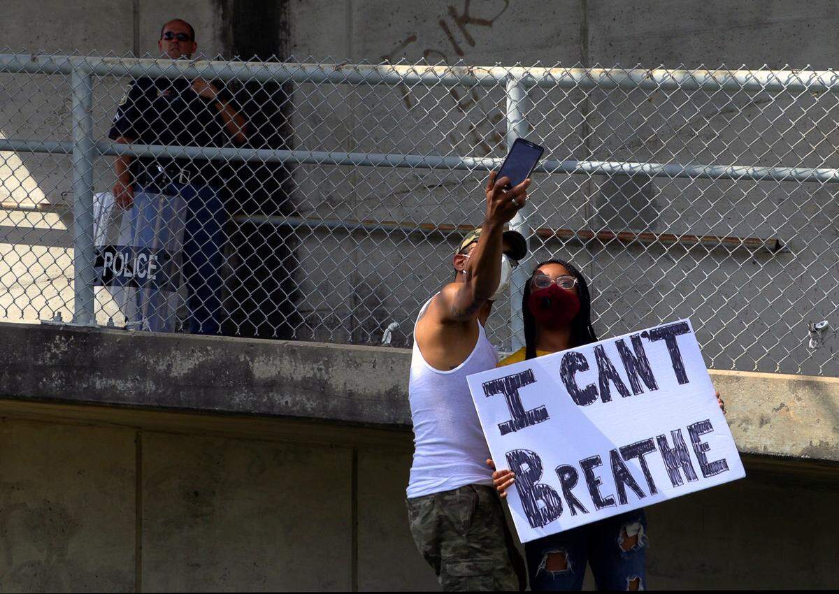 For a second day area residents rallied in Columbus to protest the death of George Floyd, the black man killed May 25 by a white Minneapolis police officer. About 50 demonstrators gathered Monday at the Walmart on Victory Drive, one day after about 200 people chanting “I can’t breathe” and “Black Lives Matter” marched through downtown Columbus, where some later were arrested for blocking traffic Sunday afternoon.