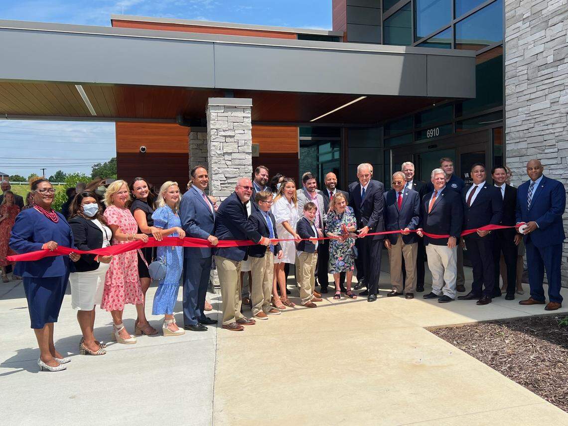 U.S. Secretary of Veterans Affairs Denis McDonough, local elected officials and leaders from veterans organizations celebrate new VA clinic in ribbon-cutting ceremony