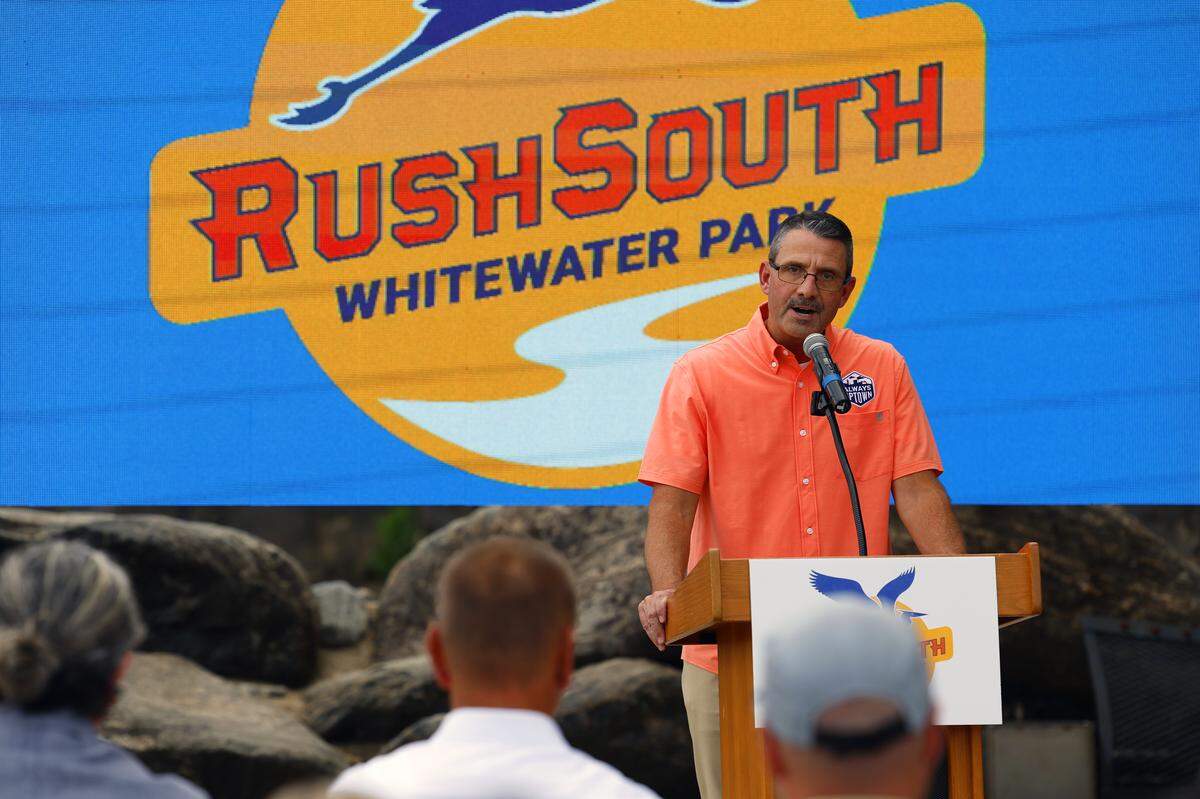 Steve Morse, the president and CEO of Uptown Columbus Inc., speaks at a July 30, 2025 press conference where he announced plans to create a wave for surfers on the Chattahoochee River in Columbus, Georgia. 07/30/2025
