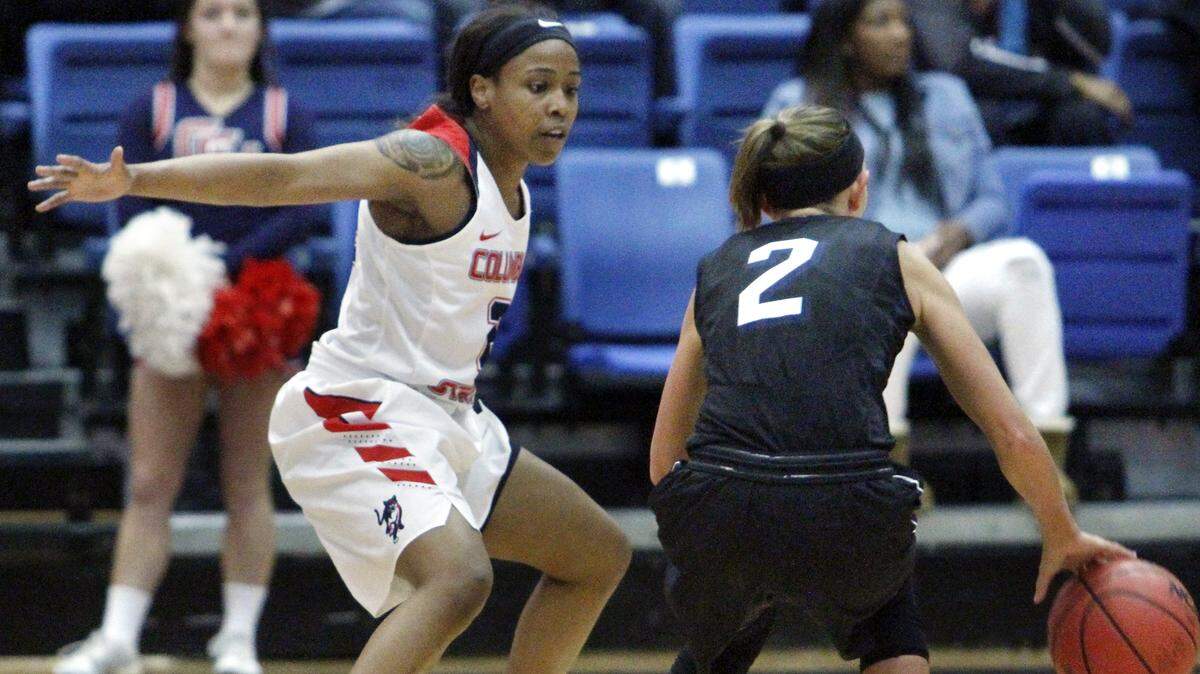FILE - Columbus State University's Tatiana Wayne guards Lincoln Memorial's Karsen Sims in the NCAA Southeast Regional championship game in the Lumpkin Center.