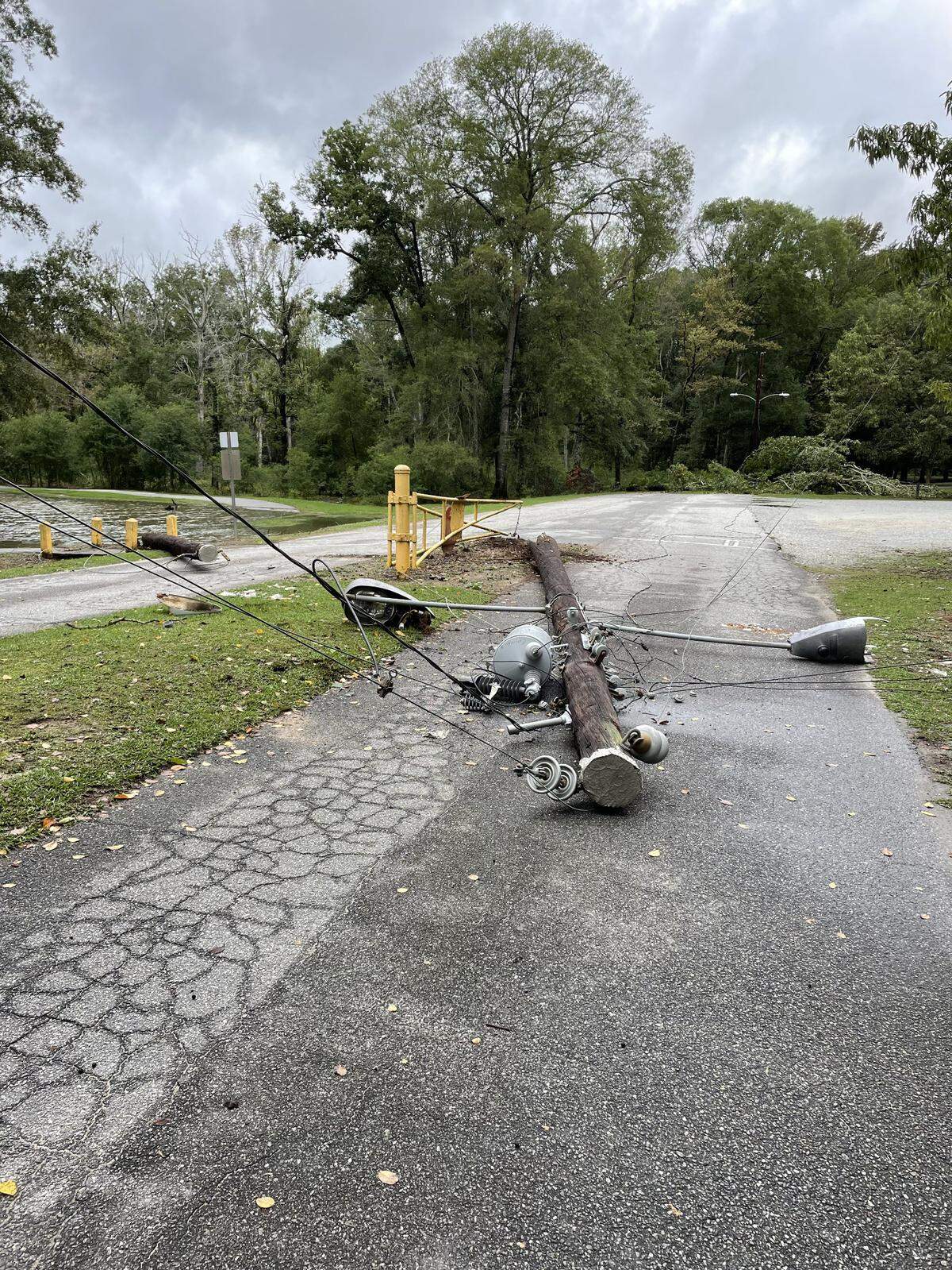 A fallen power pole is shown Sept. 27, 2024, at Cooper Creek Park in Columbus after the storm associated with Hurricane Helene came through the city.