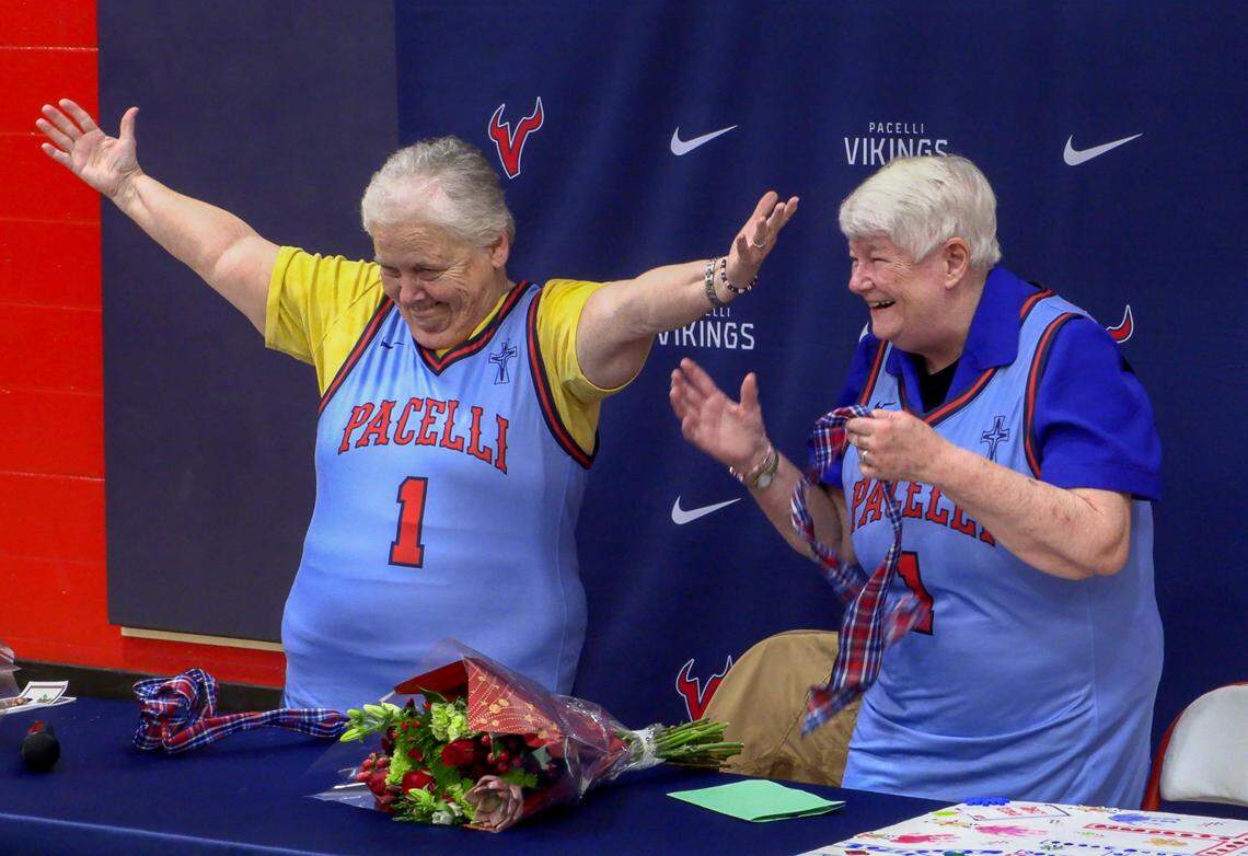 Sister Margaret Downing, left, and Sister Pat Thompson, both of the Sisters of Mercy were recognized at St. Anne-Pacelli Catholic School on Dec. 9, 2024, with a ceremony honoring them. Both are retiring, and the school unveiled a special basketball jersey in their honor. 12/09/2024