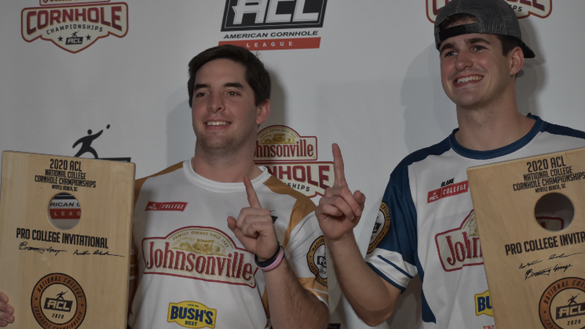 Blaine Rosier (right) and Travis Moore (left) pose with trophies after winning the American Cornhole League’s Collegiate Doubles National Championship in Myrtle Beach, S.C. Rosier and Moore are students at Auburn.