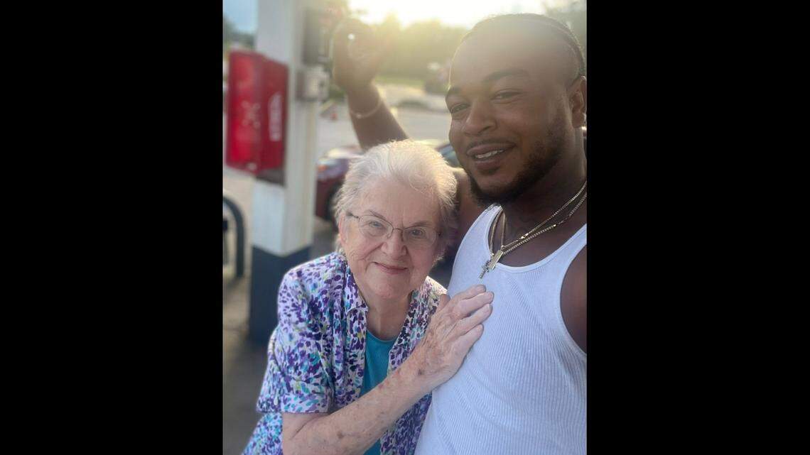 JaQuan Sanks takes a selfie with Barbara Kimbro on Sept. 5, 2022, at the Circle K gas station at 5919 Miller Road in Columbus. Kimbro says Sanks saved her from falling backward after she lost her balance while stepping onto the curb. Her Facebook post about the incident has gone viral.