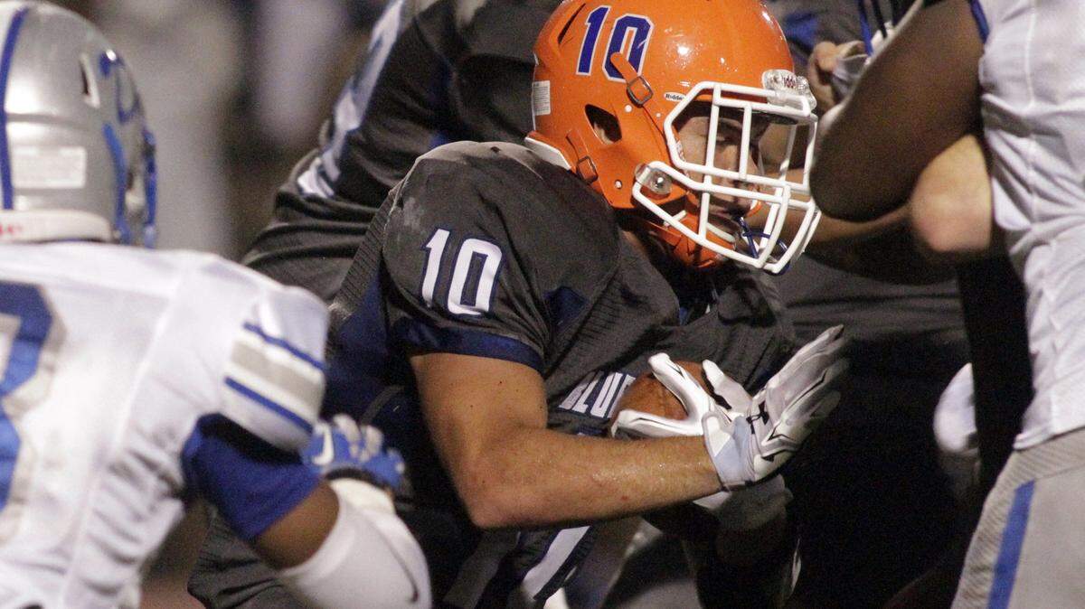 ROBIN TRIMARCHI rtrimarchi@ledger-enquirer.com 
 Columbus running back Ty Lucas carries the ball against Manchester in first half play Thursday. 09.10.15