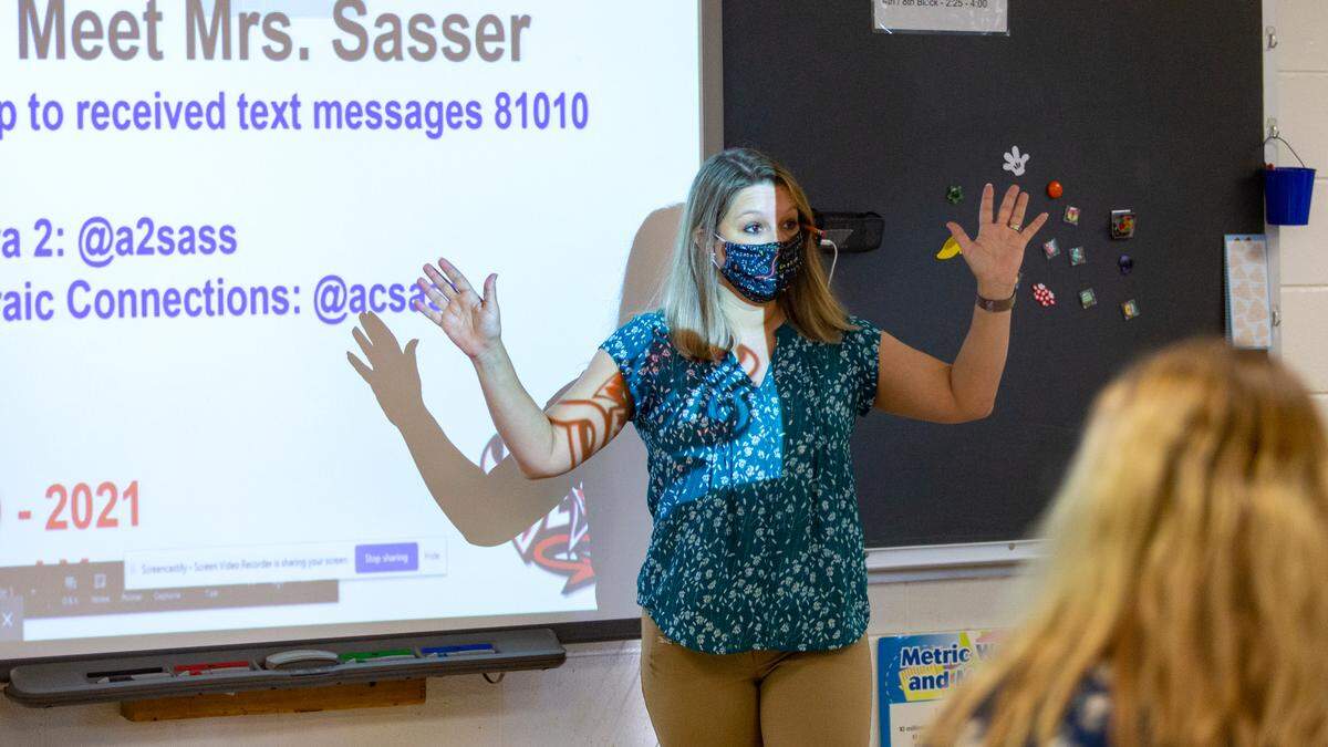 Kelly Sasser welcomes her new alegebra class on their first day of classes at Central High School on Tuesday, August 18, 2020 in Phenix City, Ala.