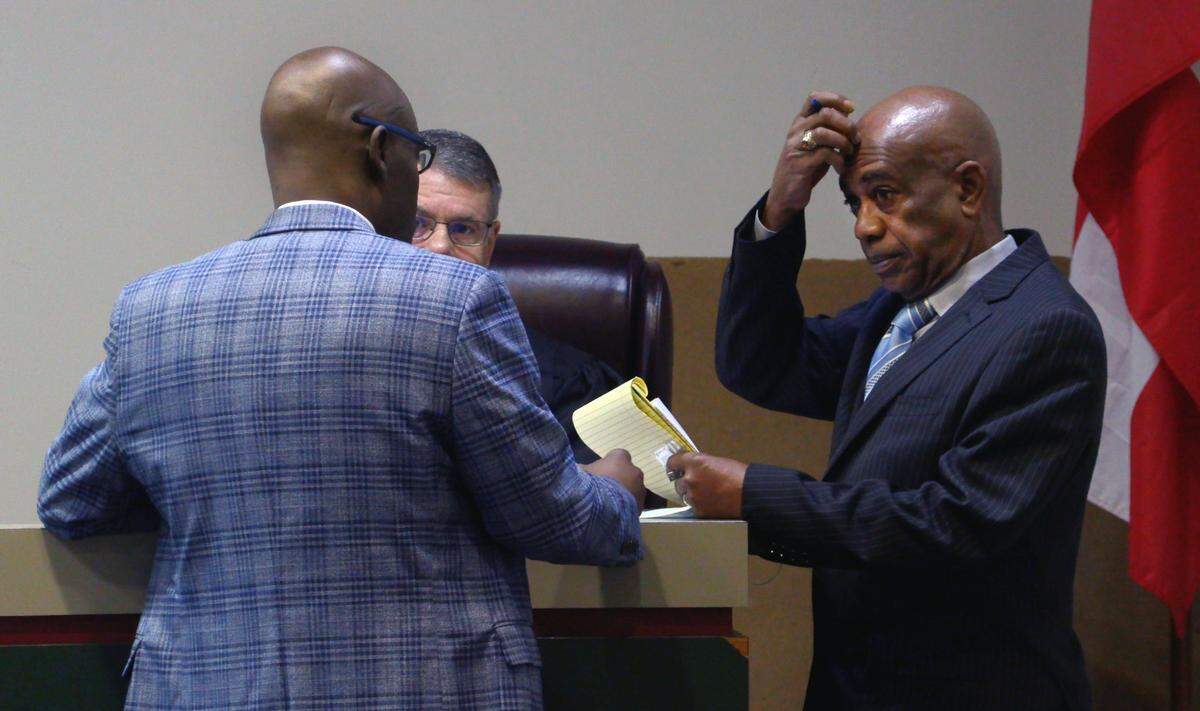David B. Ranieri, the chief judge of Recorder’s Court in Columbus, Georgia, meets with District Attorney Stacey Jackson, left, and Shevon Sutcliffe Thomas Wednesday morning prior to a preliminary hearing for a juvenile charged with murder and armed robbery in relation to a fatal shooting in Columbus in November 2022. Thomas represented the juvenile during the hearing. 01/11/2023