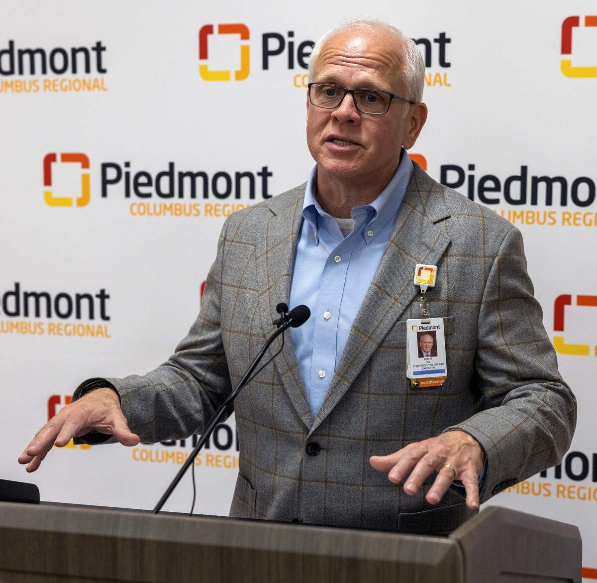 Piedmont Columbus Regional CEO Scott Hill speaks at the ribbon-cutting ceremony May 11, 2026, to celebrate the completion and naming of a $58 million expansion and renovation project that has increased the Piedmont Columbus Regional midtown hospital’s critical care capacity. Named the Shelby and Wanda Amos Intensive Care Unit, the 99,038-square-foot project includes 43 new ICU beds, plus 68 renovated rooms, across three nursing units.