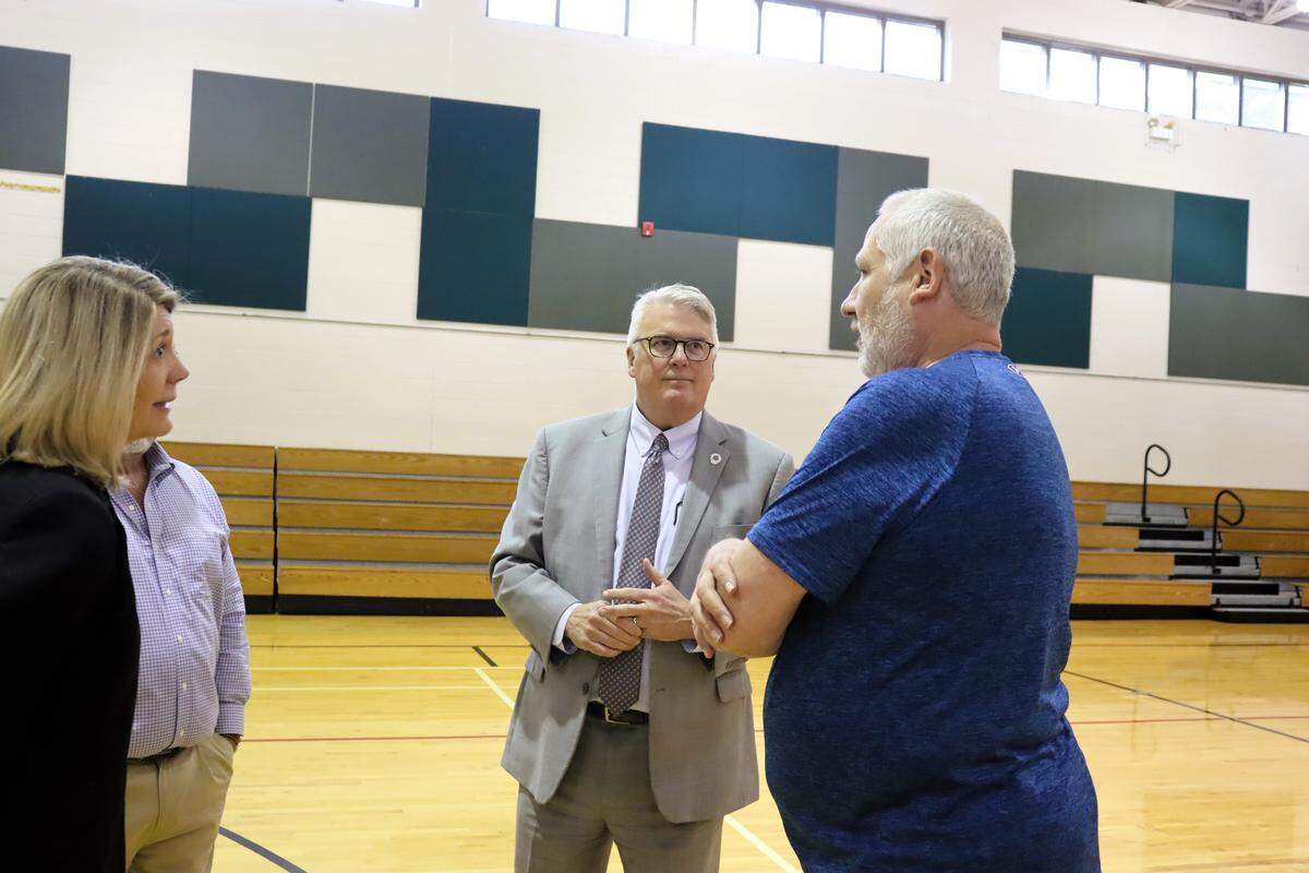 During a forum March 23, 2026, at the Psalmond Road Recreation Center in Columbus, Mayor Skip Henderson listens to Upatoi resident Tom Gibbons as he is not getting information about sewage water pipelines that might go on his property for Project Ruby, a proposed hyperscale data center.