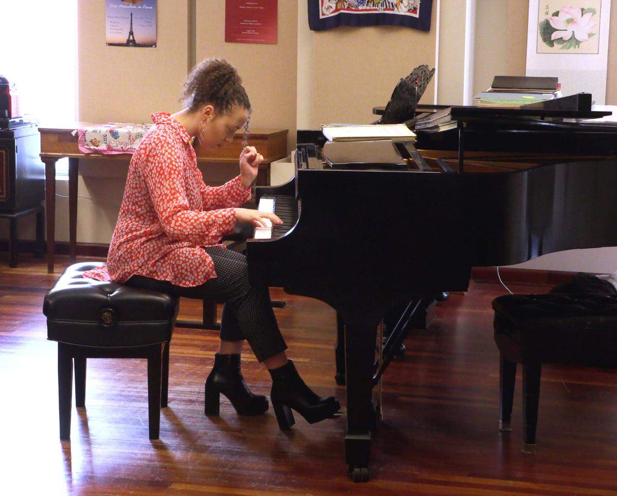 Nikol Bazalytska, left, a student at Columbus State University, practices in preparation for an upcoming recital. 02/24/2023