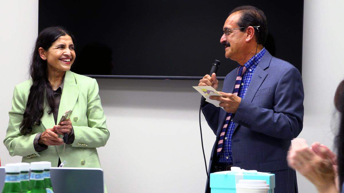 Dr. Bantwal Baliga, right,an endocrinologist, speaks during the grand opening of the Chattahoochee Institute for Wellness, Longevity and Weight Management in Columbus, Georgia. Baliga, his wife, Dr. Prathibha Baliga, left, who specializes in family medicine, and Dr. Mallika Thiruppathi , not pictured, have partnered to open the practice.