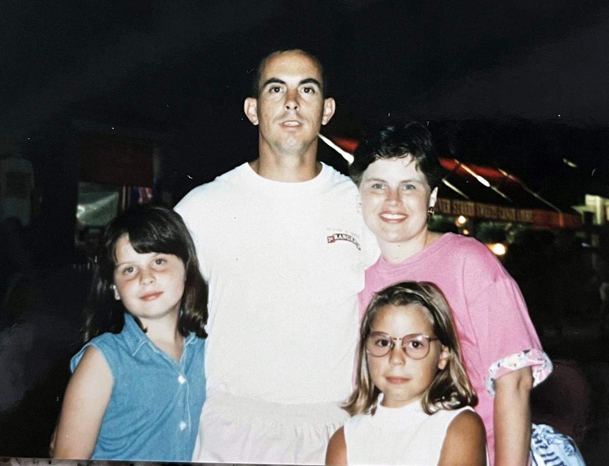 U.S. Army 1st Sgt. Glenn Harris, who was among the soldiers who survived the 1993 Battle of Mogadishu in Somalia. He is seen here with his daughters, Tara and Heather, and wife, Sandy.