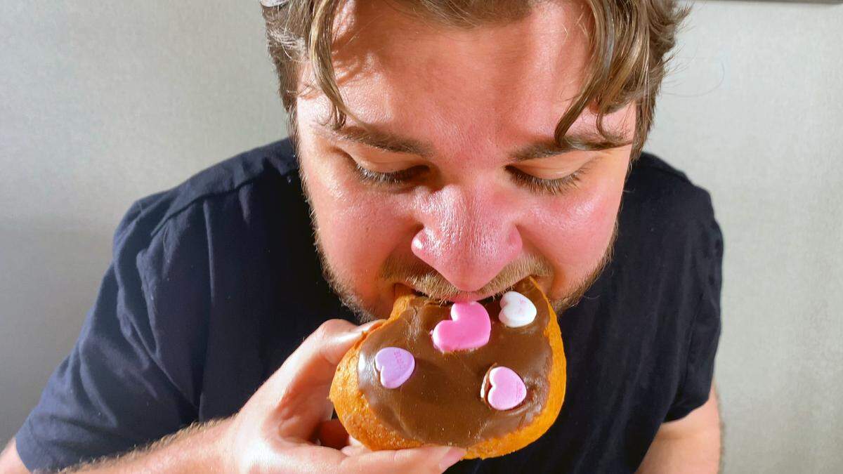 Ledger-Enquirer reporter Kelby Hutchison samples five special, Valentine’s Day donuts from different doughnut shops in Columbus, Georgia. 02/14/2024