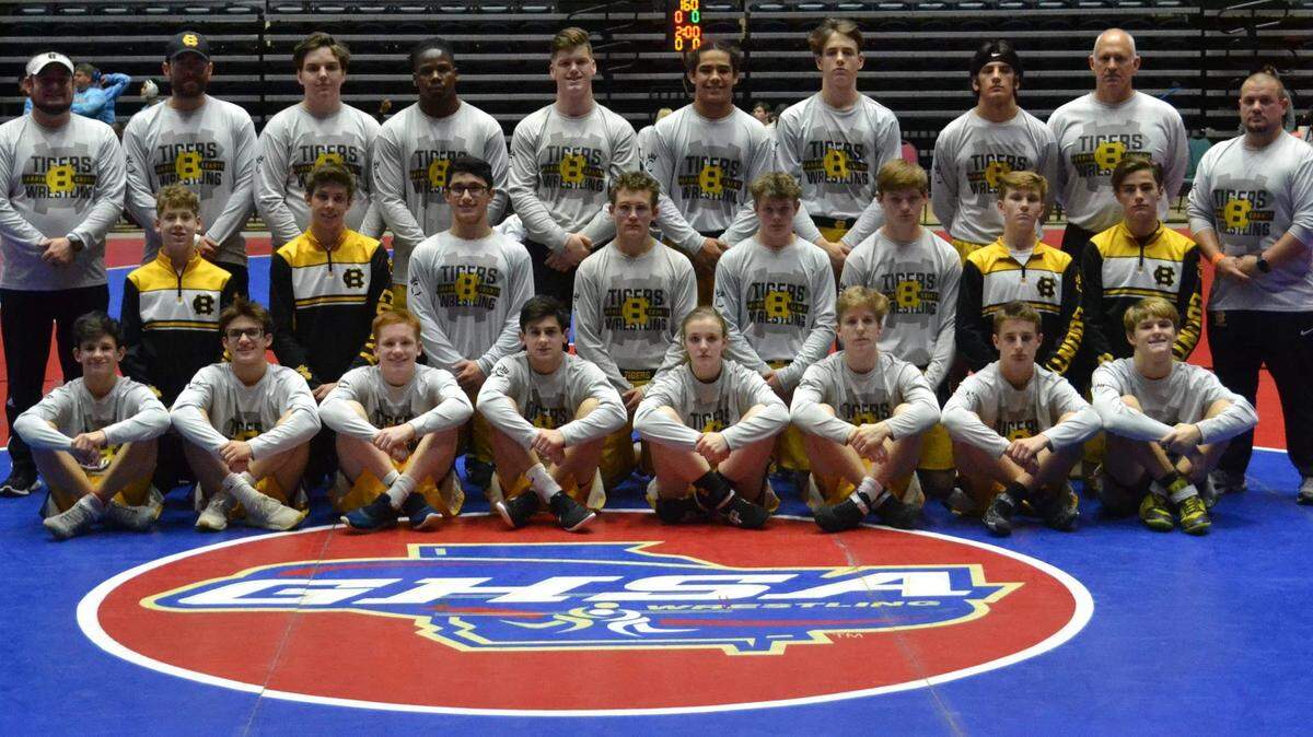 The Harris County High School wrestling team poses for a photo at the 2019 GHSA state duals championships in the Macon Centreplex.