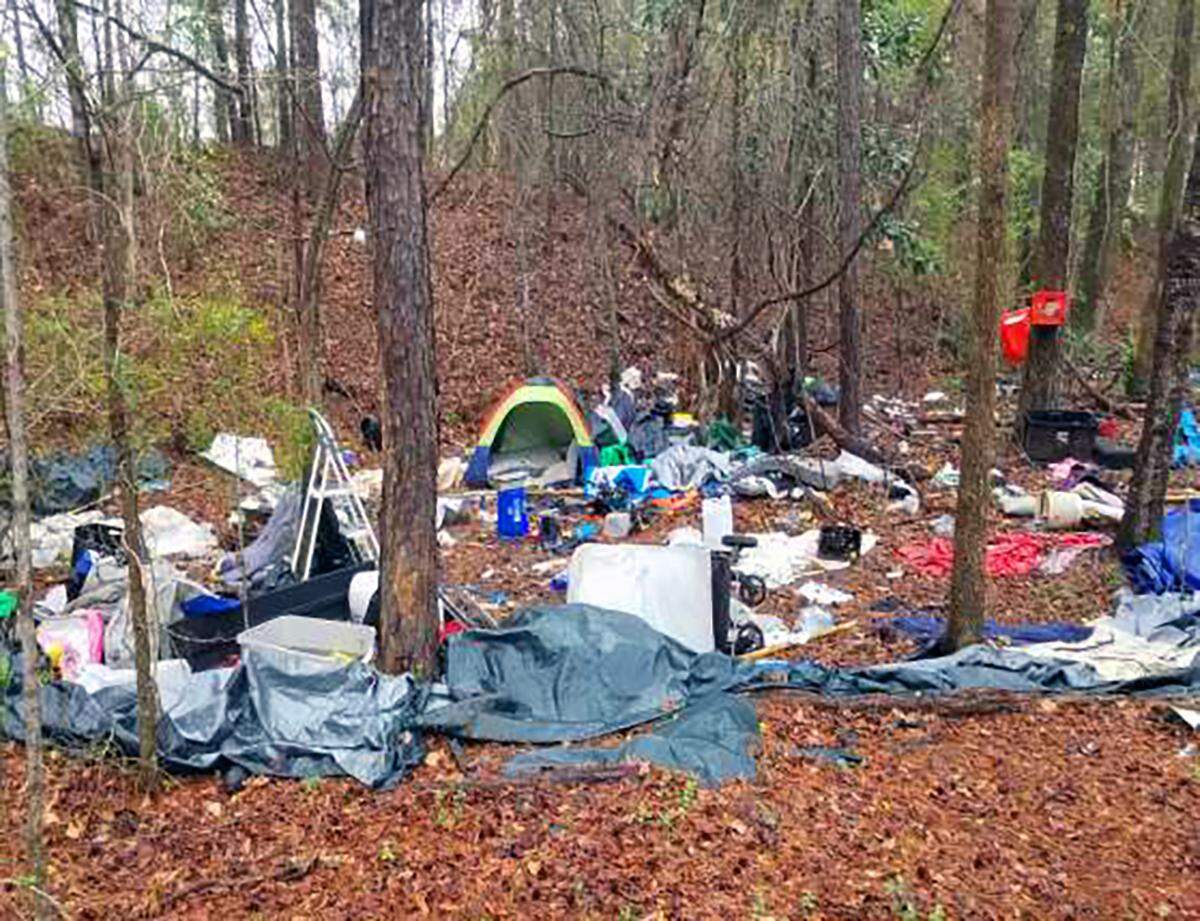 This photograph is from a report to Columbus, Georgia, city leaders from the Department of Public Works about homeless camps in Columbus, Georgia.