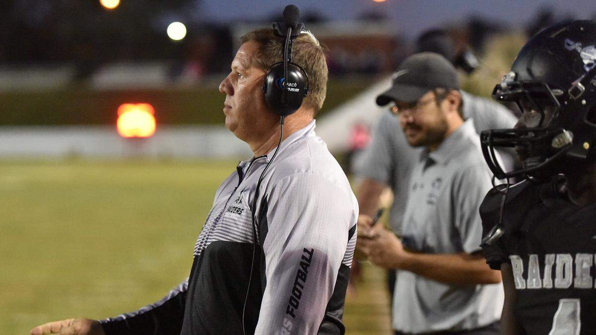 Shaw head coach Al Pellegrino watches his Raiders play in this L-E file photo. Funeral arrangements for Pellegrino, who died Monday, are set for June 6.