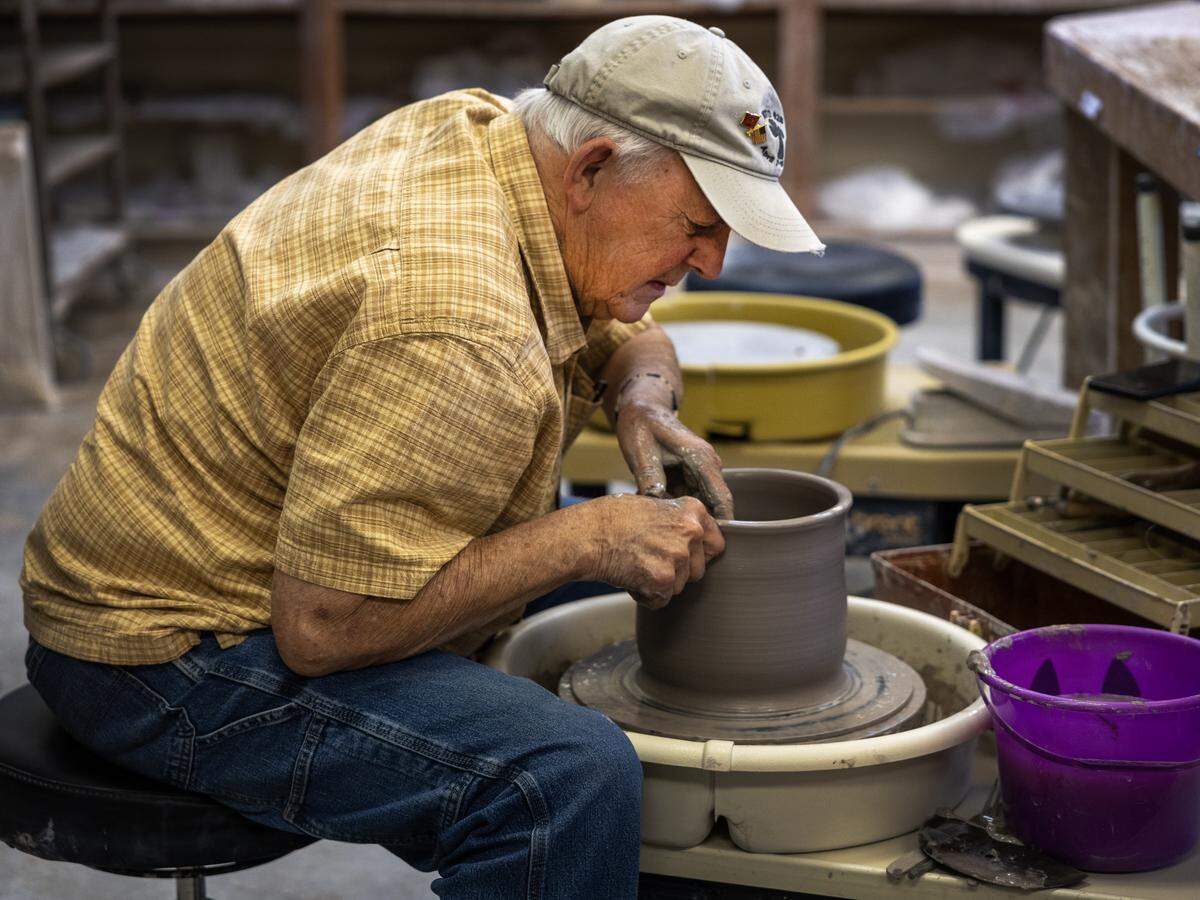 Folk potter Ned Berry works on a pottery wheel at Britt David Studio in Columbus on April 14, 2026.