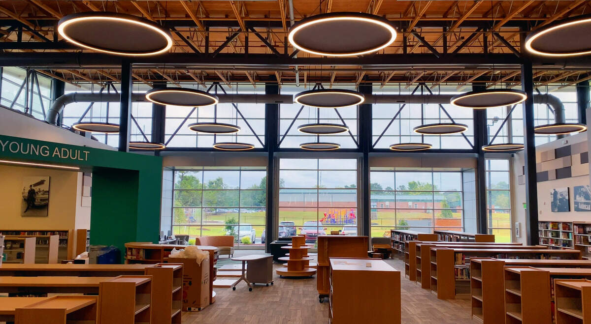 The South Columbus Public Library is set to reopen September 17, 2024. The renovation and expansion project has created an open floor plan, large windows, and unique lighting. 09/12/2024