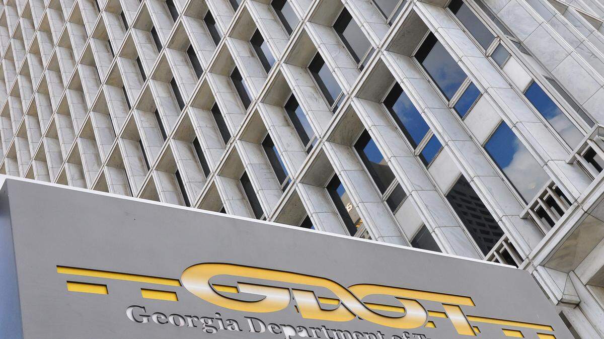 A Georgia Department of Transportation worker who was working to clear icy roads was killed Thursday morning after a CSX train slammed into his salt truck