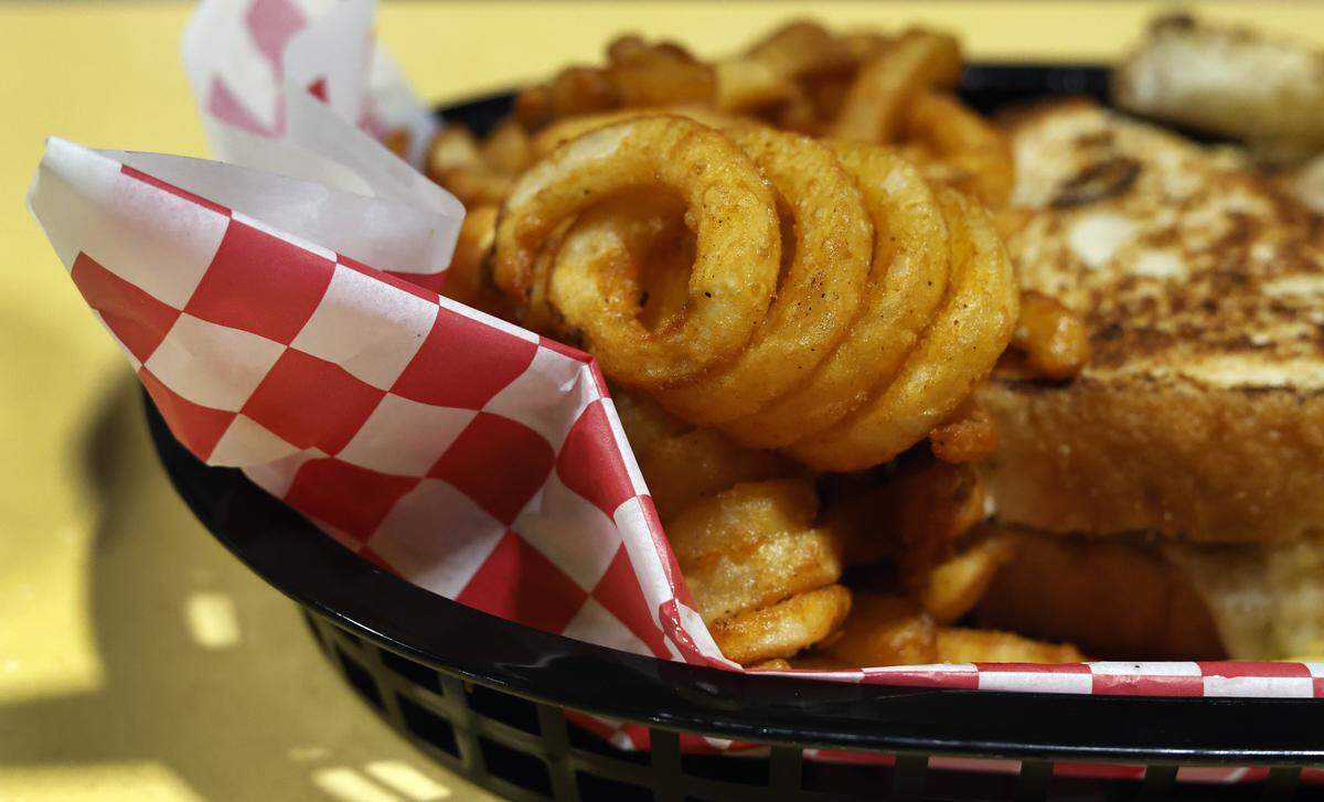 Ledger-Enquirer reporter Kelby Hutchison got a side order of curly fries with his Midtown Turkey Reuben at Midtown Cafe & Bakery in Columbus on July 25, 2025.